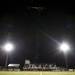 A helicopter dropped miniature footballs for a lottery at halftime during the game between Huron and Pioneer on Friday. Daniel Brenner I AnnArbor.com